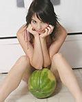 Teen poses with a watermelon from Ariel Rebel 